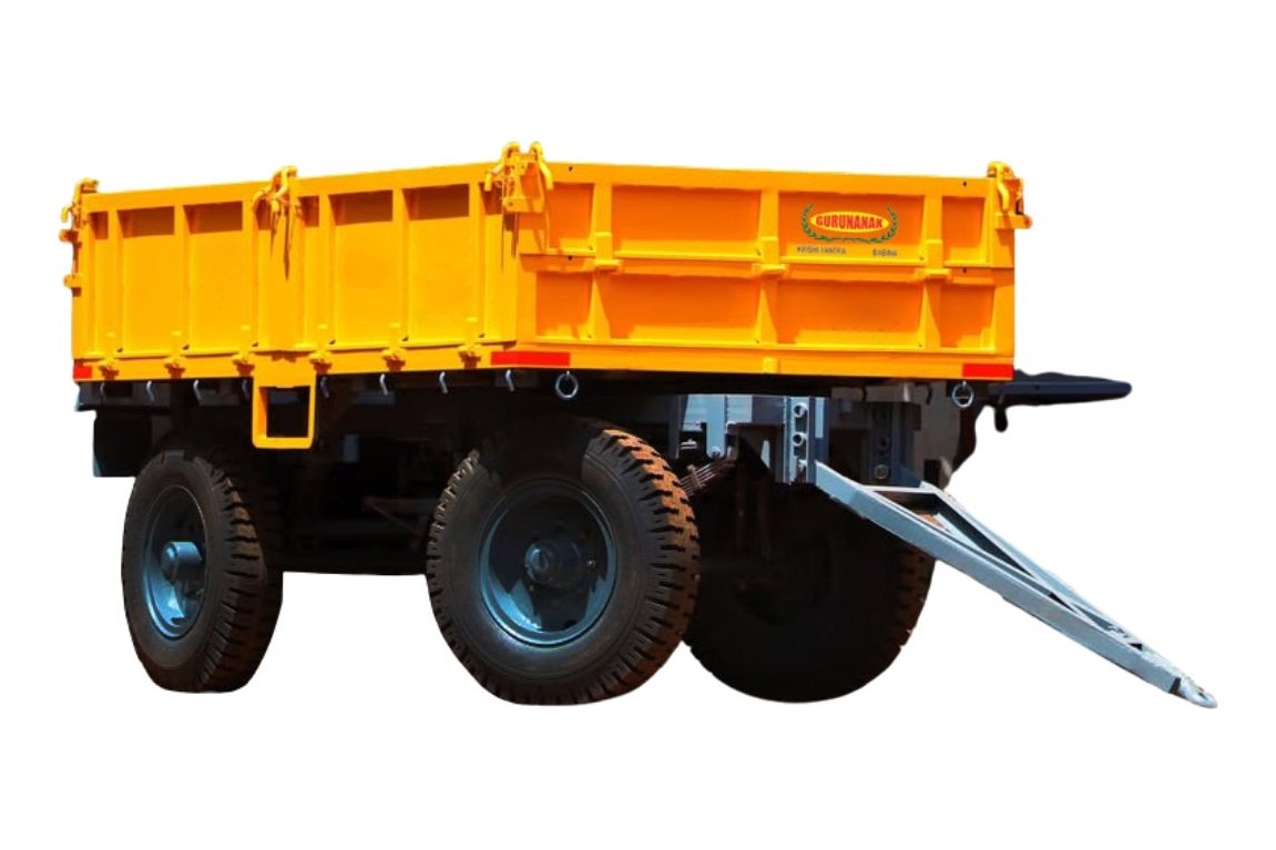 Yellow Gurunanak drop-side trailer on a multi-axle chassis