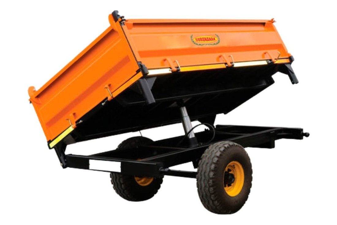 Orange Gurunanak single-axle trailer with the body raised for rear tipping